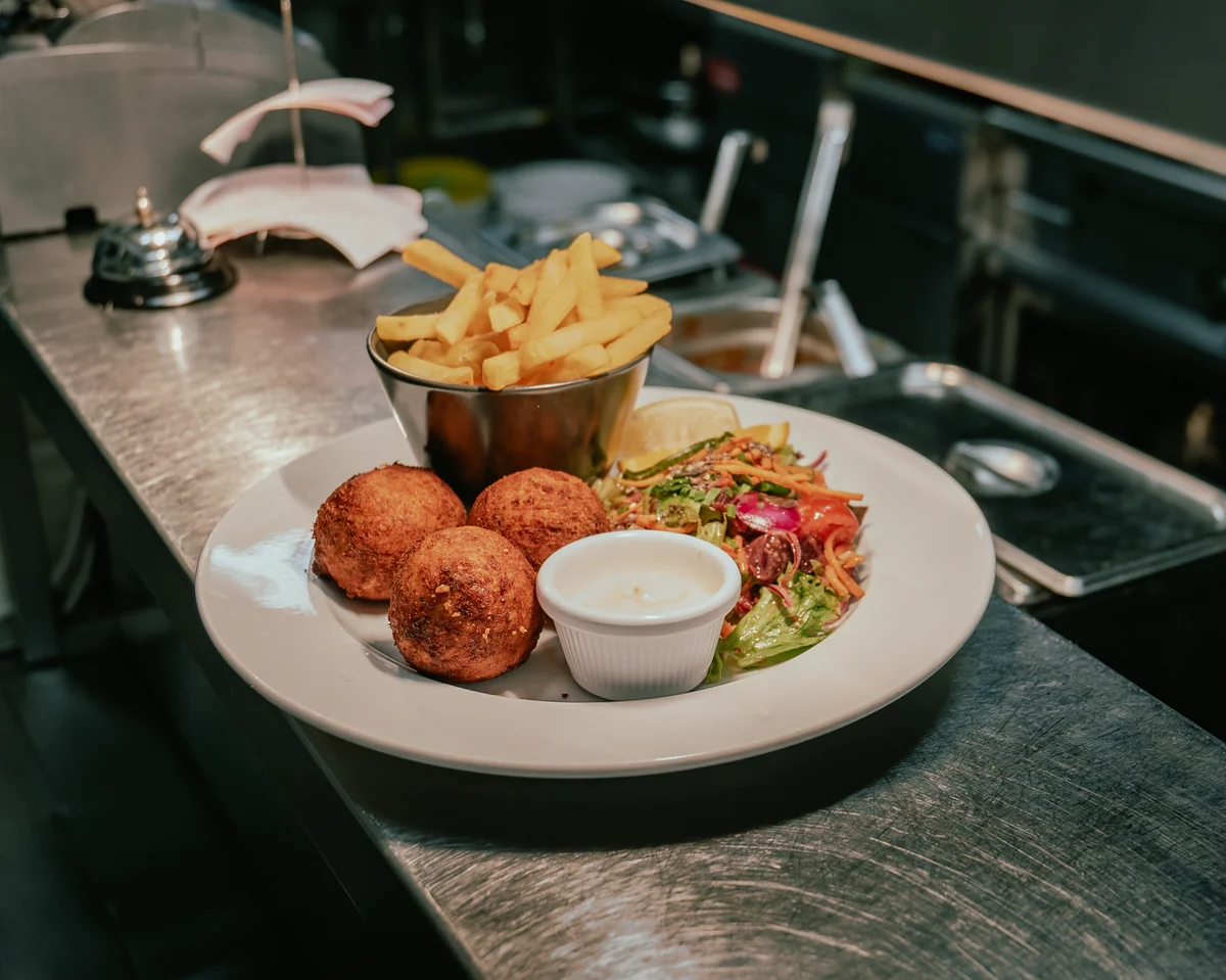 Dinner service at Adams Bar